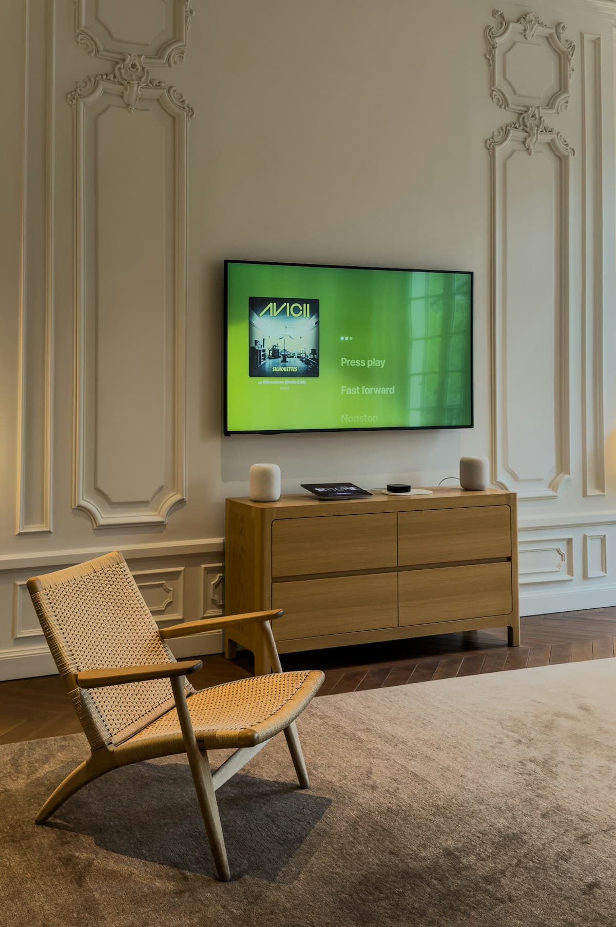 Large flat screen TV professionally mounted on a wall