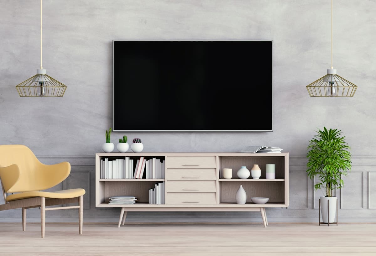 Modern living room with wall-mounted TV and built-in shelves
